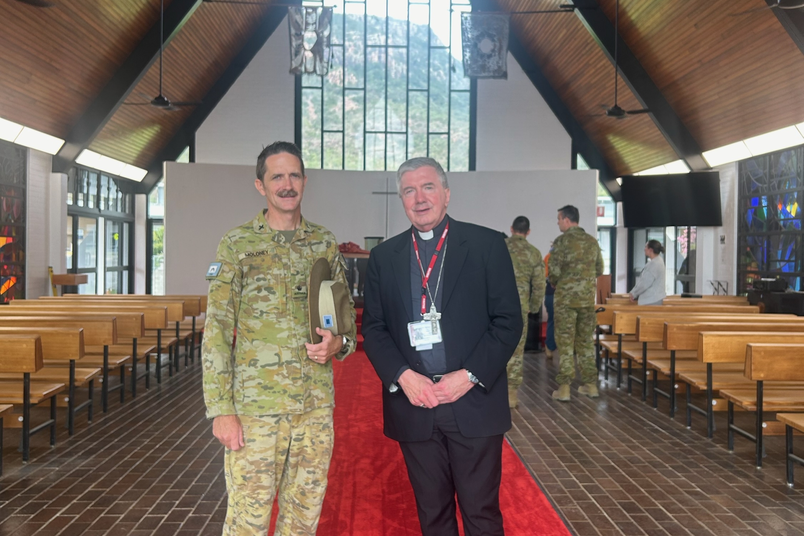 Archbishop Prowse and Chaplain Joseph Moloney Inside the chapel at Lavarack Barracks Townsville Queensland