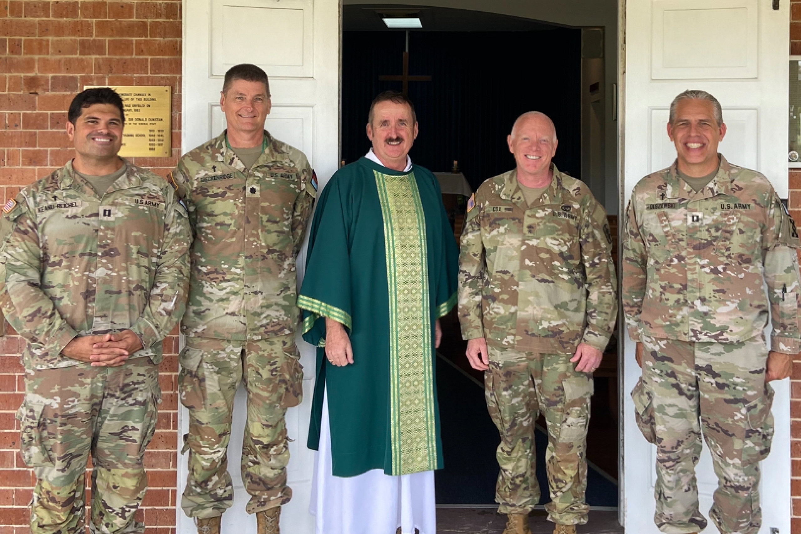 Multi-national Chaplains during Talisman Sabre 2025 with CHAPLAIN Peter Devenish-Meares of the Military Diocese in Australia in the centre of the image