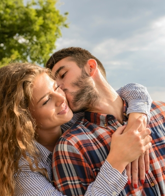 couple hugging outdoors