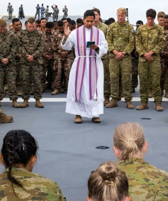 CHAP Joel Vergara saying mass while on exercise to multiple nations serving members