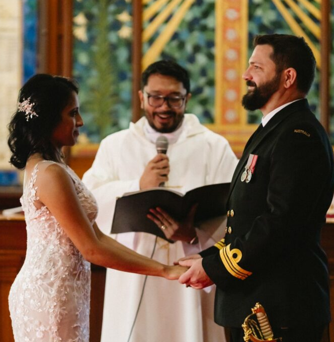 CHAPLAIN Adrain Gomez officiating a wedding at HMAS Watson 